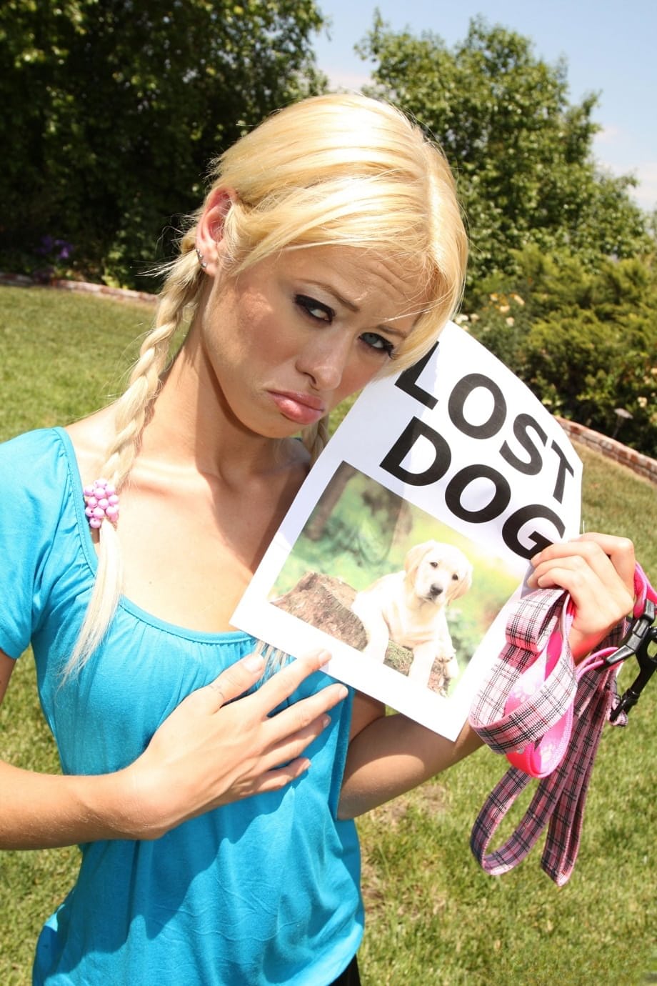 Blonde Rebecca Blue with pigtails looks for her lost dog and finds a hard cock