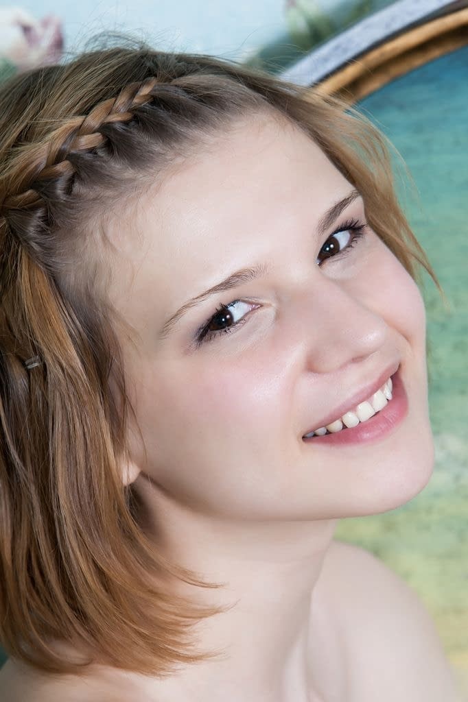 Sweet young Mariam bends over to display her hairy beaver and tight little ass