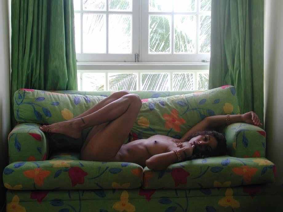 Dee Baker spreads open her silky Indian folds while basking on a classic chesterfield - 6