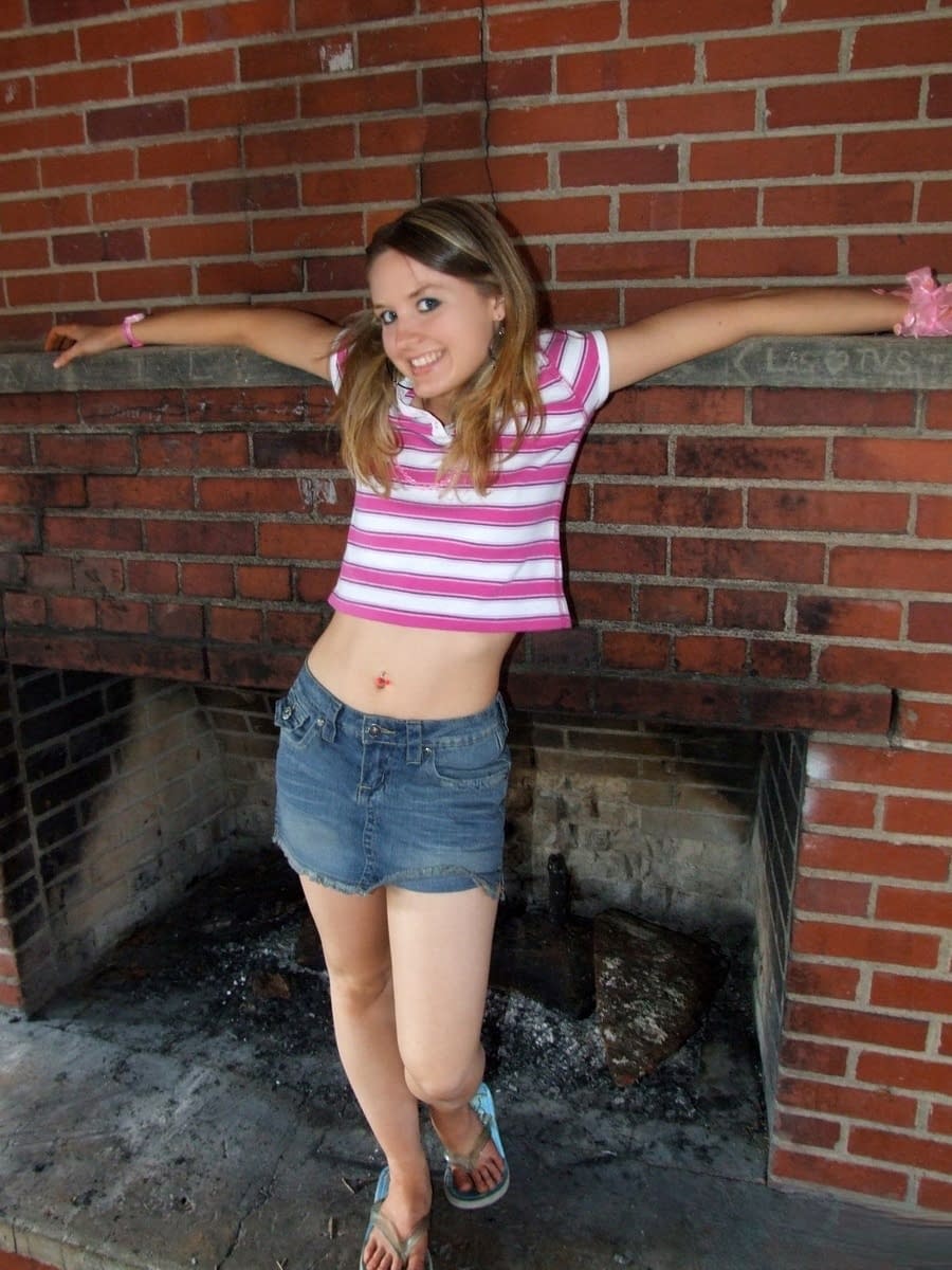 Cute teen flashes her small tits and ass while in the outdoors