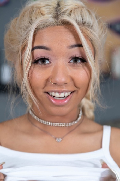 Gia DiBella sports braided blonde hair during close-up POV action