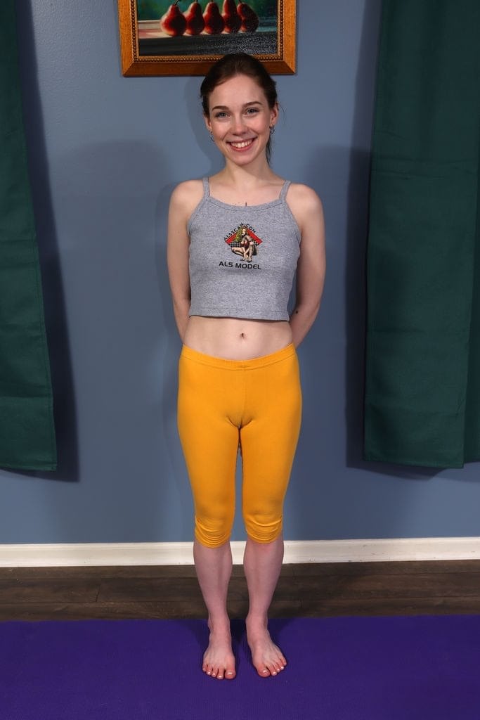 Nice teen Venus Vixen pisses on the floor after doing yoga and toying her cunt