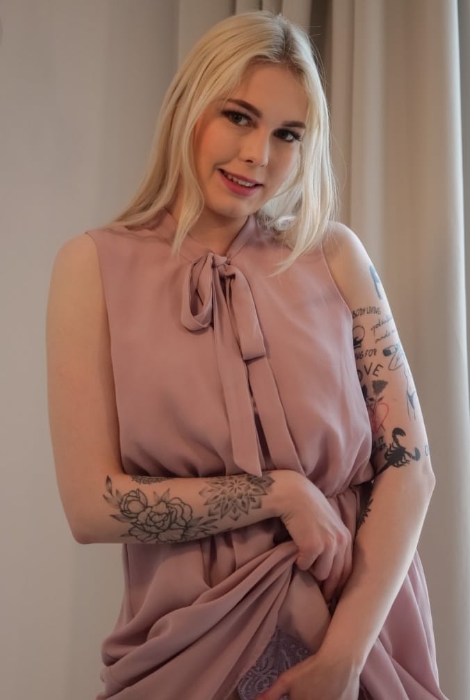Beautiful blonde Mimi Cica reveals a pierced nipple before showing her vagina