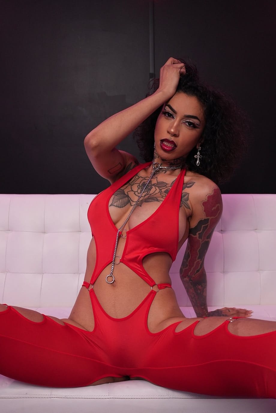 Tattooed brunette Ravyn Alexa sports a creampie after sex with a white boy