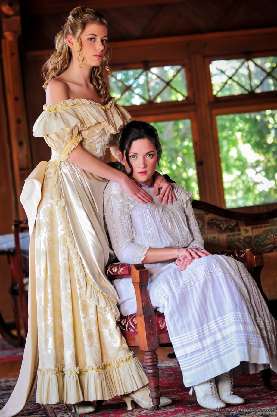 Hot chicks Stephanie Swift & Nicole Ray help each other out of vintage attire