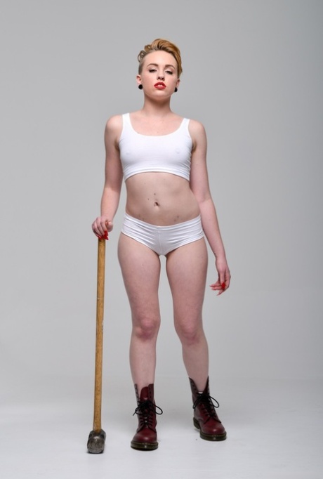 Miley May strips her white panties flashing pierced tongue - 1