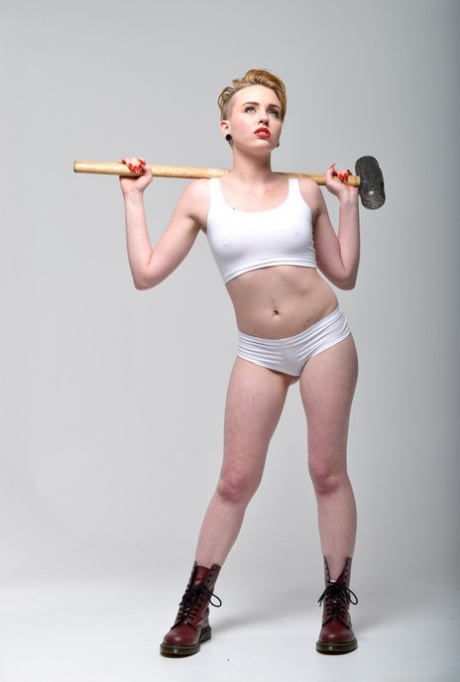 Miley May strips her white panties flashing pierced tongue - 9