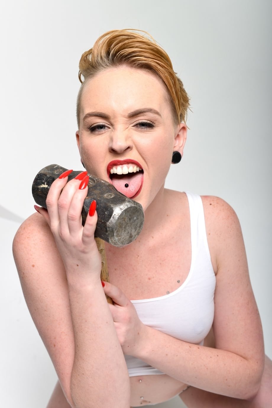 Miley May strips her white panties flashing pierced tongue - 13