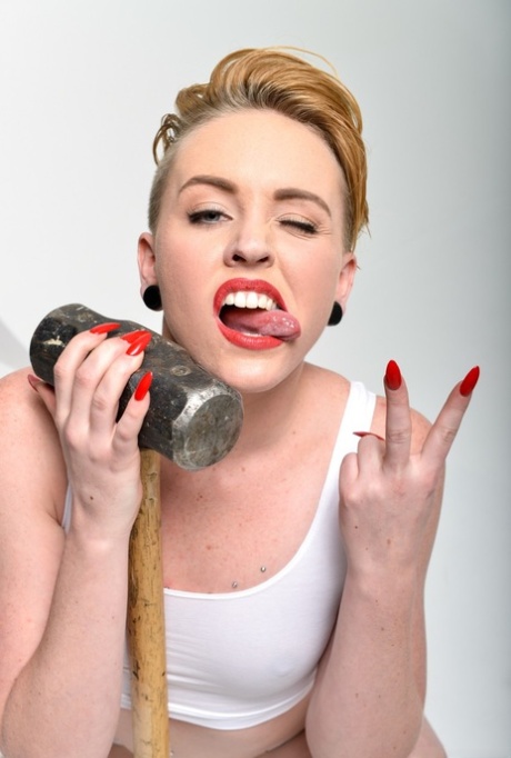 Miley May strips her white panties flashing pierced tongue - 14