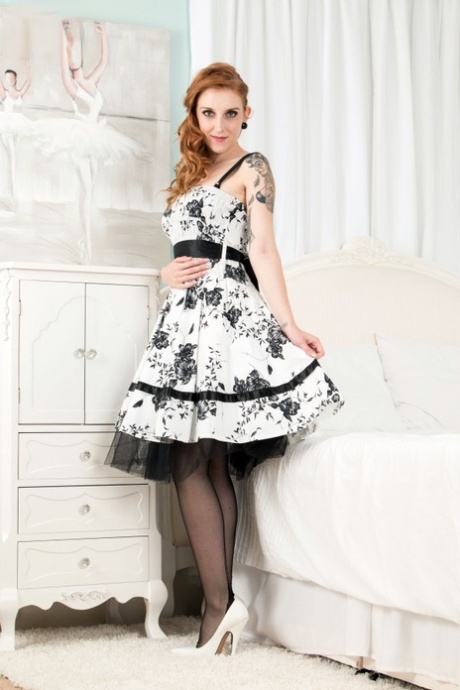 Alexia Red shimmies out of her retro dress for a sultry lingerie showcase - 1