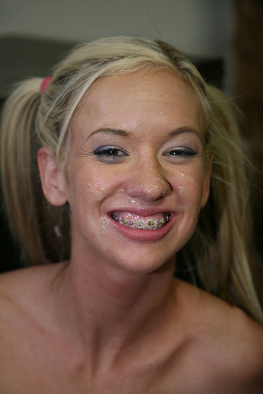 Young blonde Kaylee Hilton shows her cum covered braces after anal with a BBC
