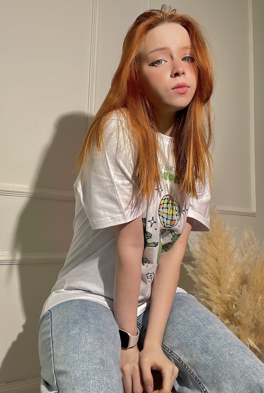 Redheaded OnlyFans teen Olash Peachy posing in her kinky compilation