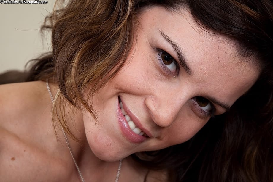 Missy flashes her hairy cunt in a teasing fully clothed pose - 16
