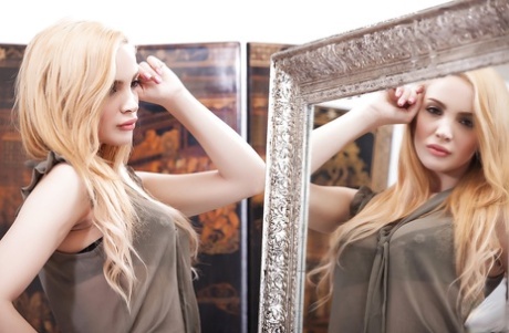 Blonde pornstar Gemma Tardiani is revealing her perfect ass