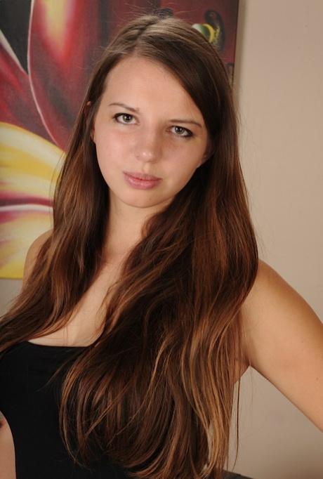 Amateur chick Anne Marie removes skirt and underwear to bare her teen body