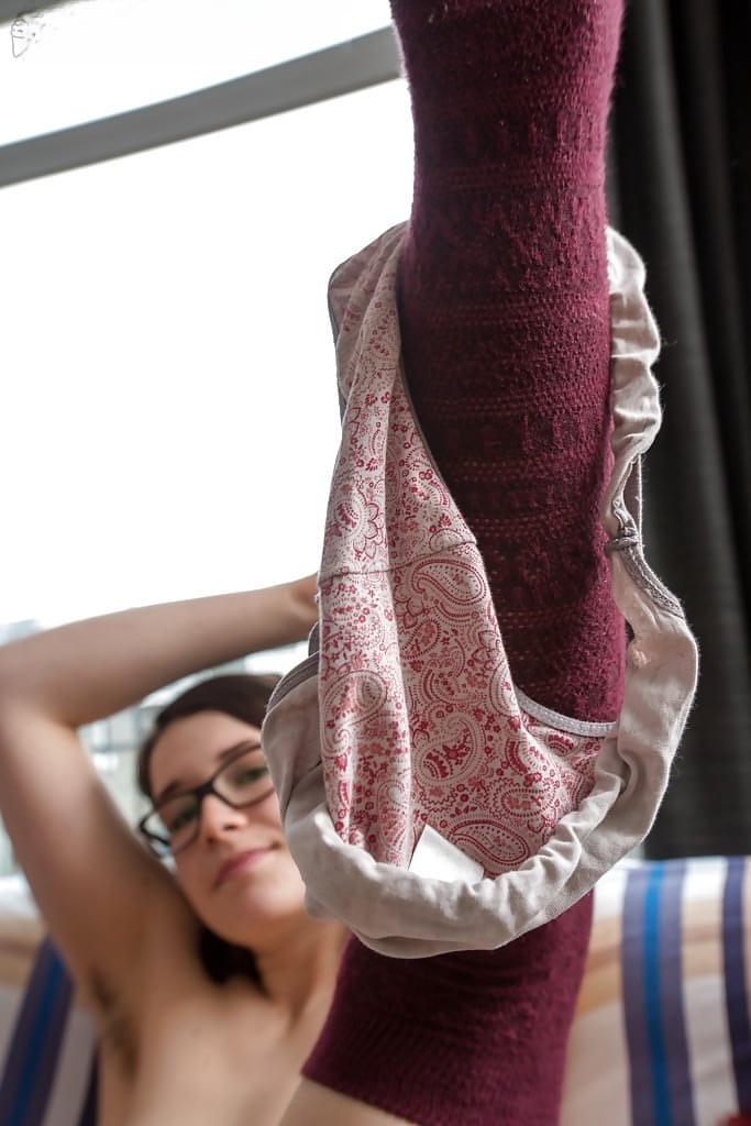 Emilia teasing pink snatch while spreading legs in glasses and long socks - 8