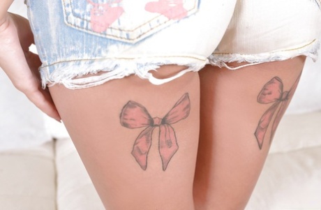 Tattooed Euro goddess Karina Grand unveils her juicy ass from tight thong and shorts - 2