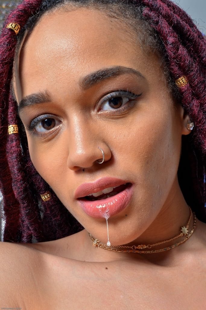 Black amateur drools onto her big tits before showing her wide open snatch