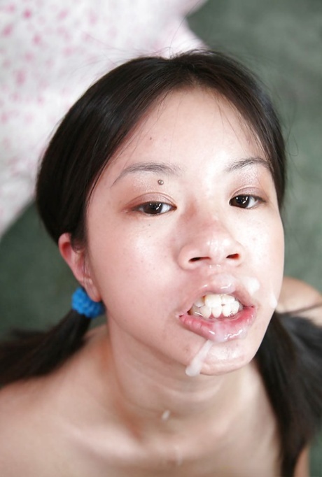 Lascivious asian teen Asia Zo sucking off a hard white cock