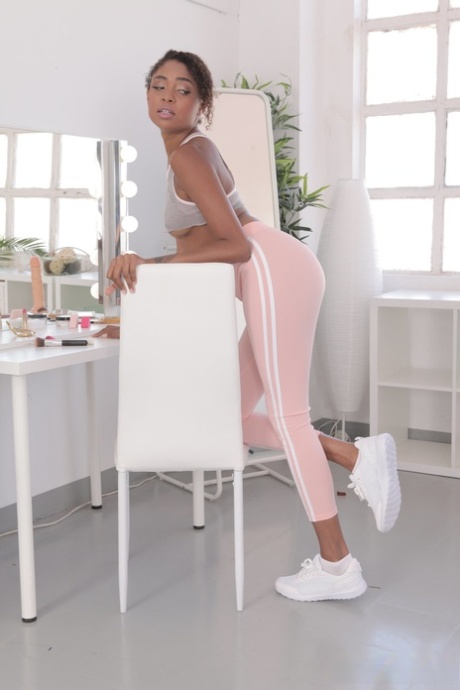 Sensual ebony beauty Luna Corazon strips completely bare and pleasures her wet pussy with eager fingers - 1