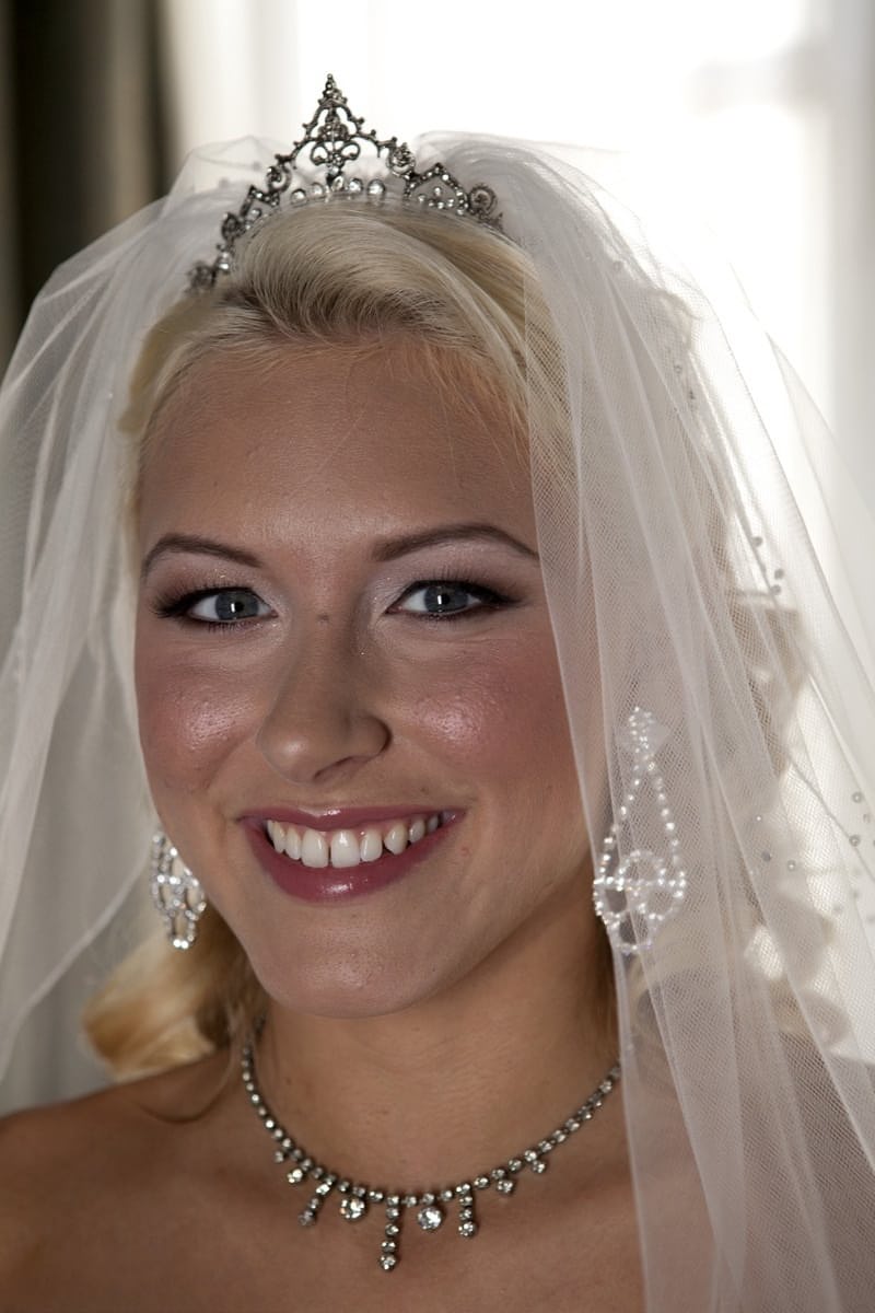 Busty blonde bride Katie Summers strips her wedding gown revealing perky breasts in sexy sheer lingerie - 2
