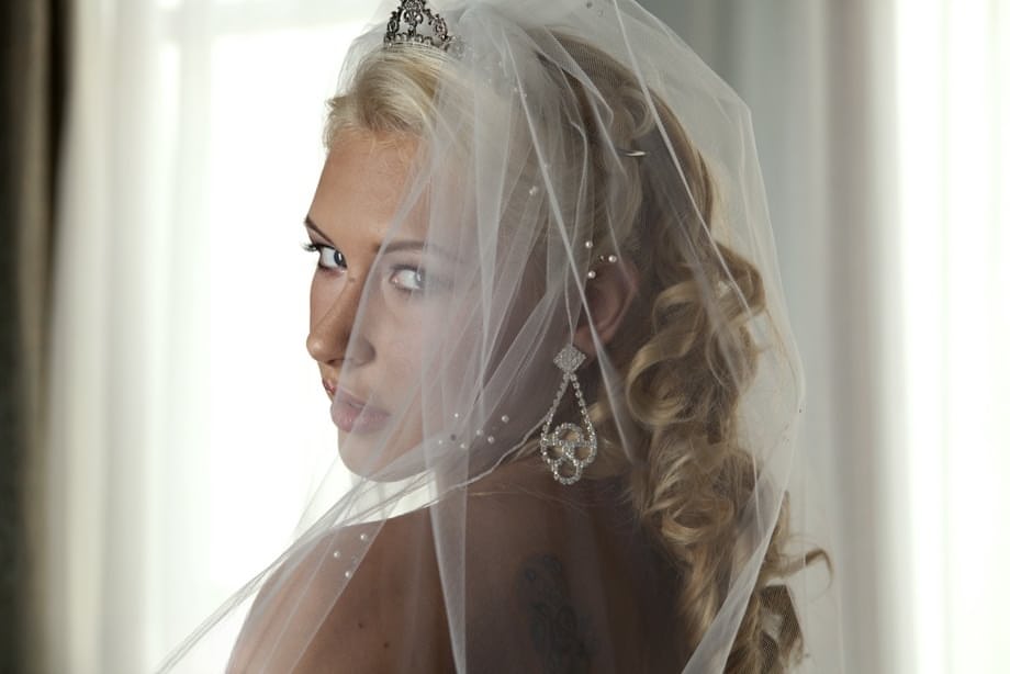 Busty blonde bride Katie Summers strips her wedding gown revealing perky breasts in sexy sheer lingerie - 9
