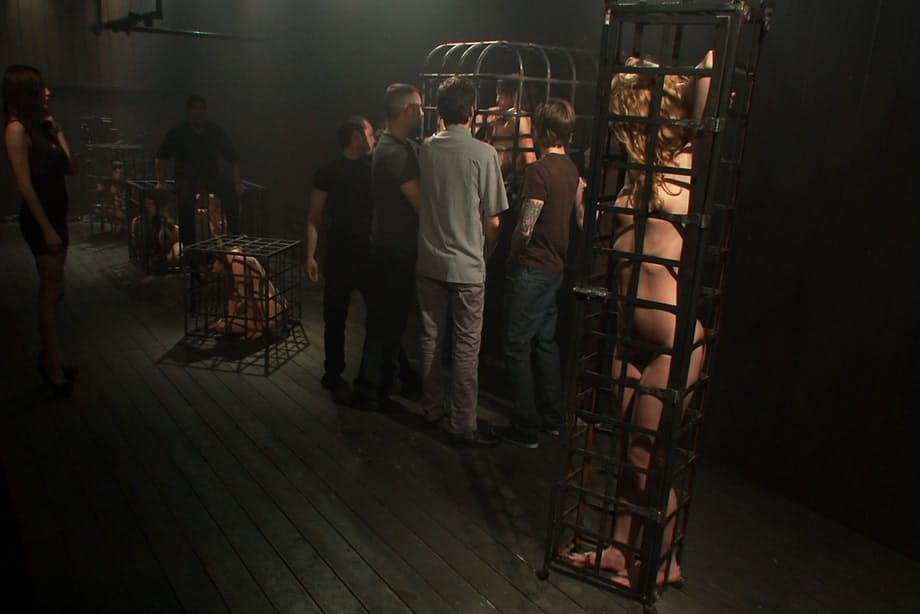 Gorgeous Pornstar Amber Rayne bound inside steel cage and hammered with multiple fingers by gang of dominant men - 21