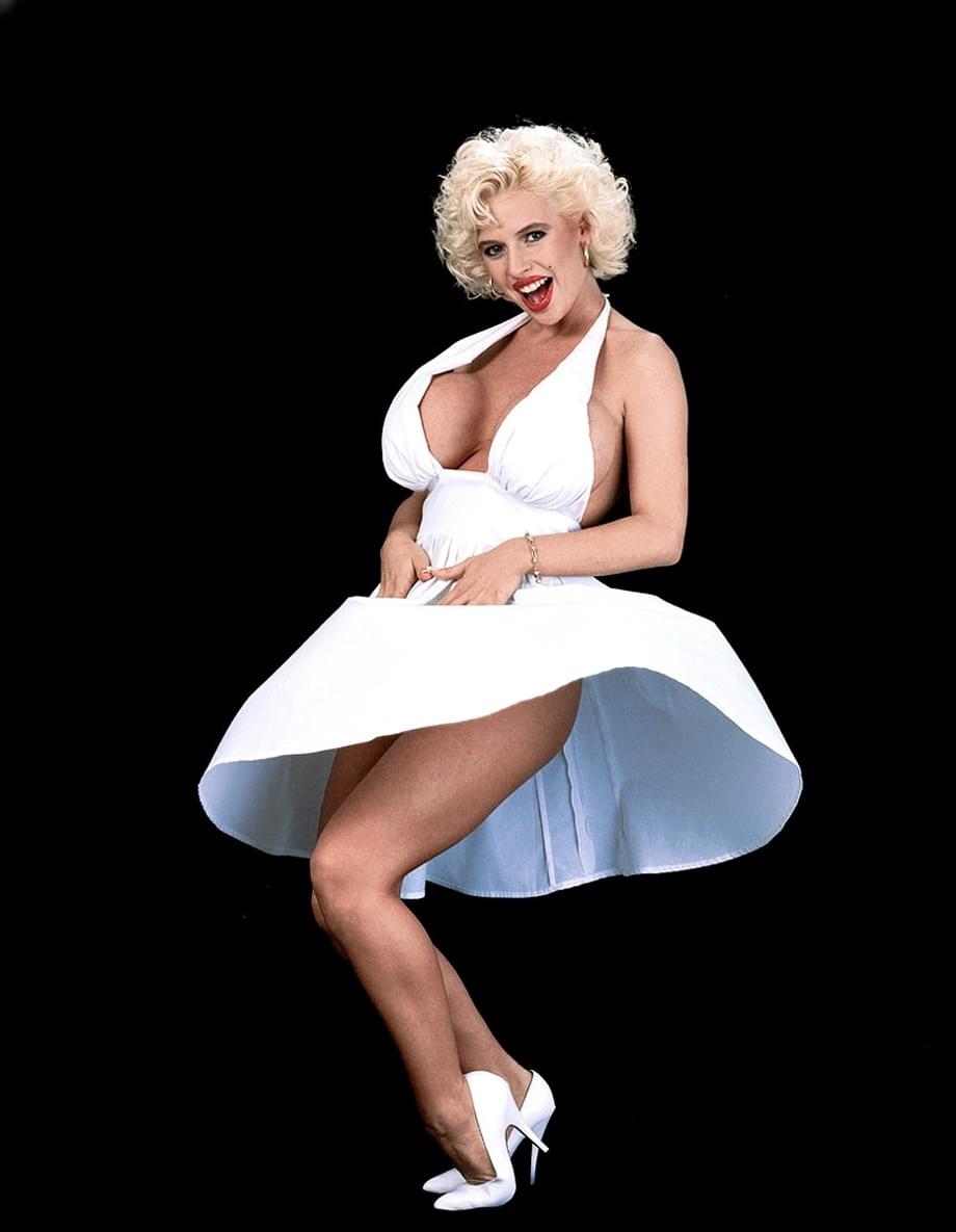 Voluptuous Sarenna Lee topless as Marilyn Monroe, seductive legs spread on red silk sheets - 7