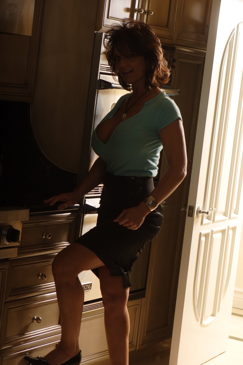 Mature goddess Deauxma reveals her massive fake boobs after slowly sliding off her lacy bra - 14