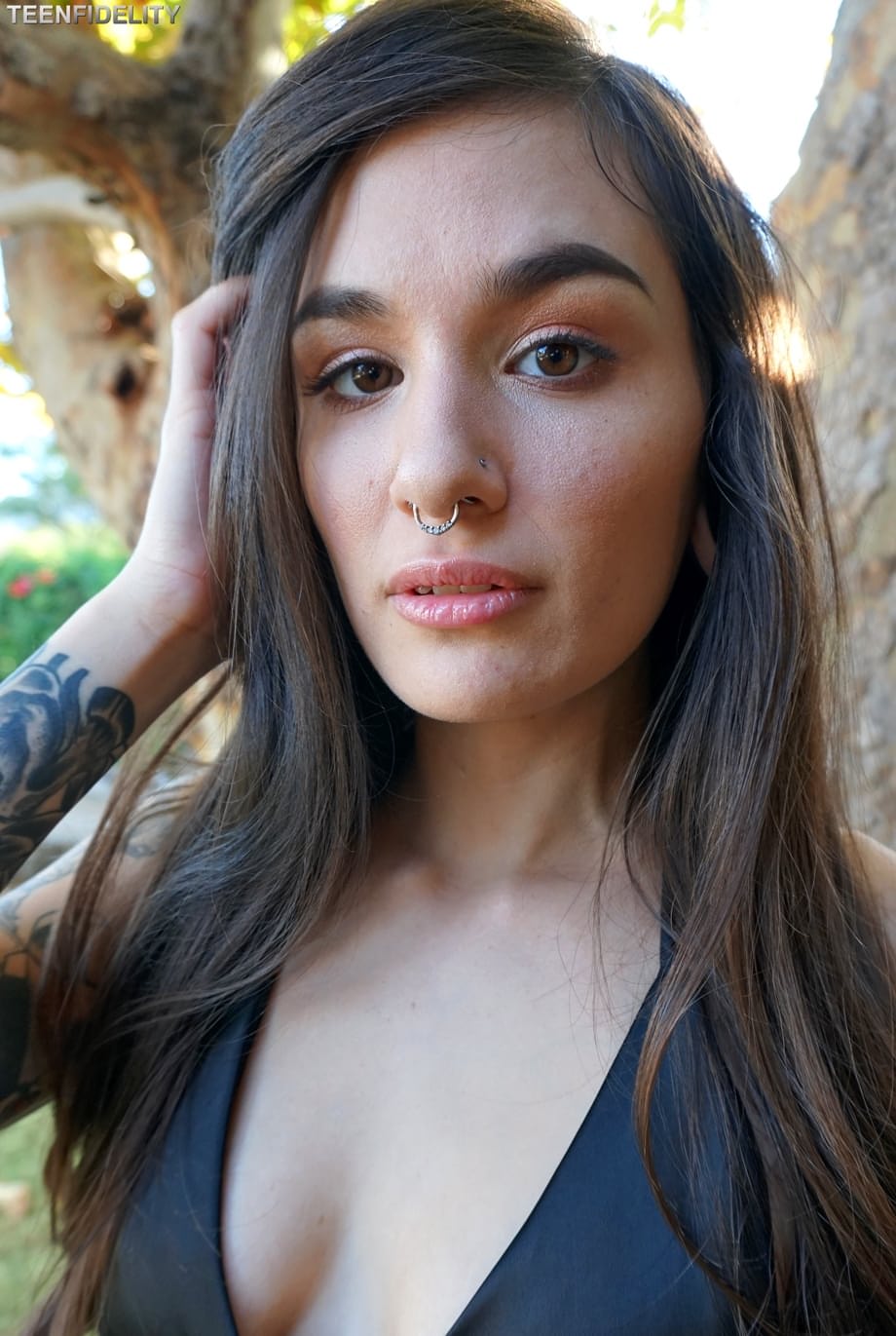 Goth brunette Luna Lovely strips her clothes and shows her sexy tattoos