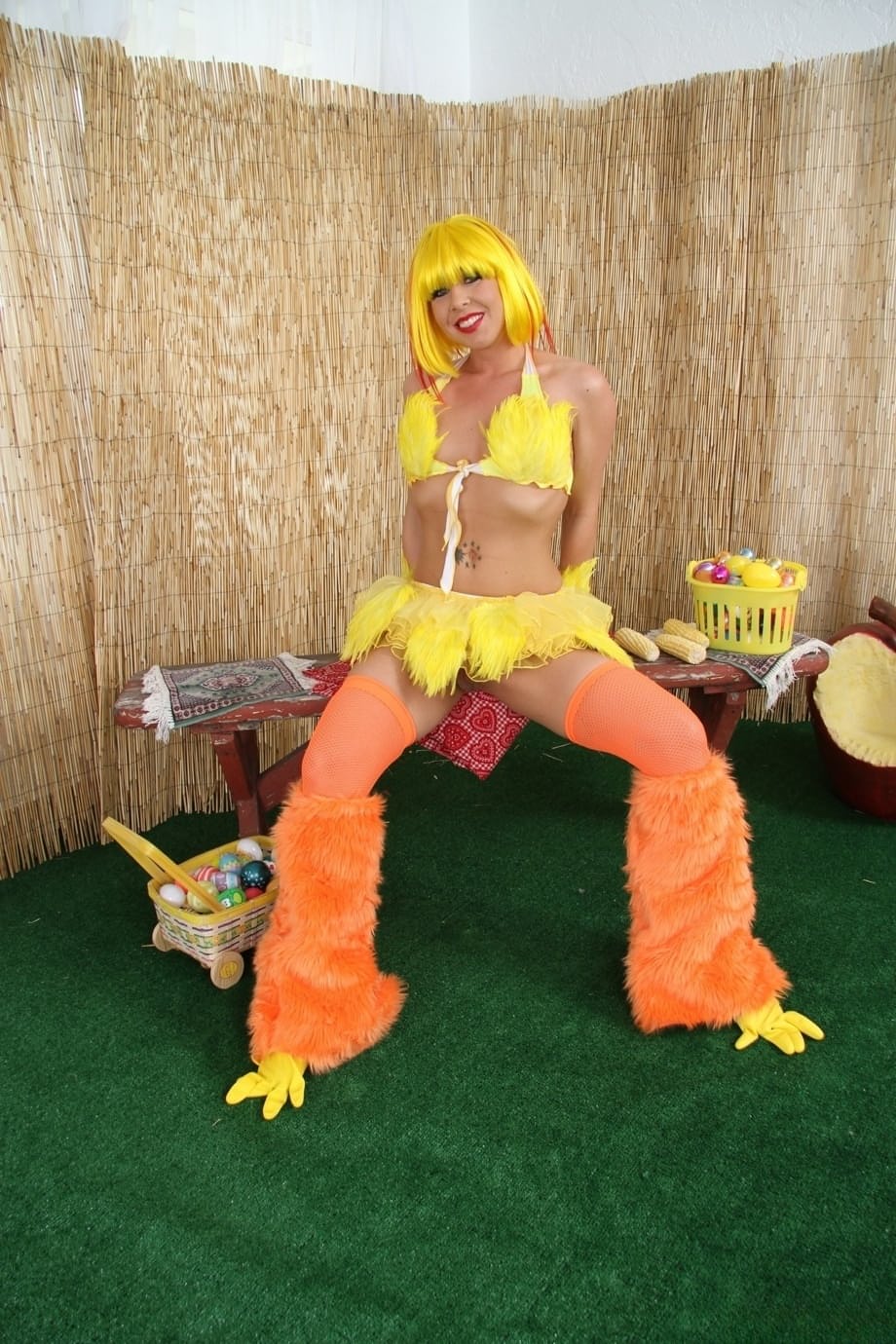 Julie Knight in slutty yellow uniform showing her big tits and perfect ass during erotic solo play - 1