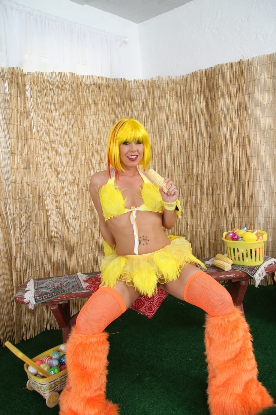 Julie Knight in slutty yellow uniform showing her big tits and perfect ass during erotic solo play - 2