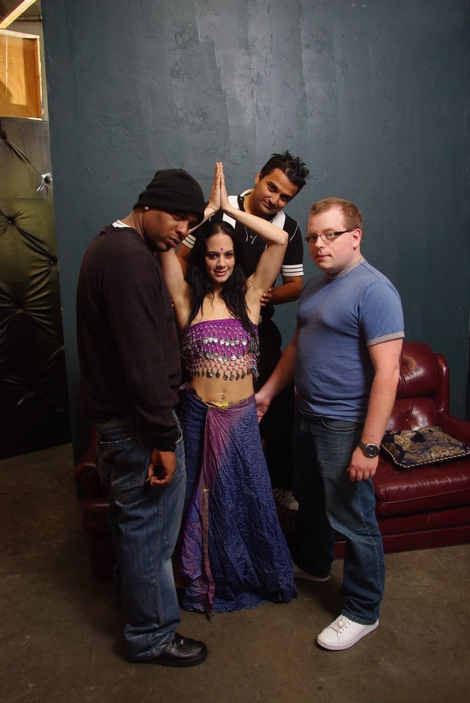 Dark haired Indian chick Vanita Sakala gets gangbanged on a sofa