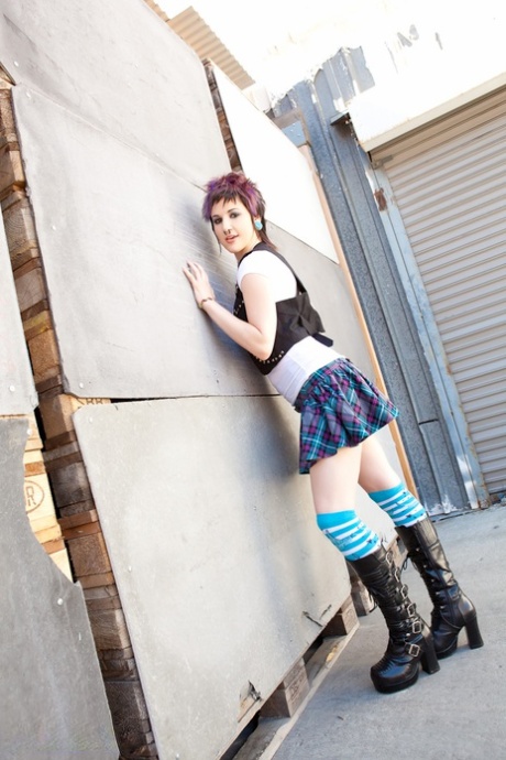 Severin Graves masturbates eagerly as punk stripper on public walkway - 1
