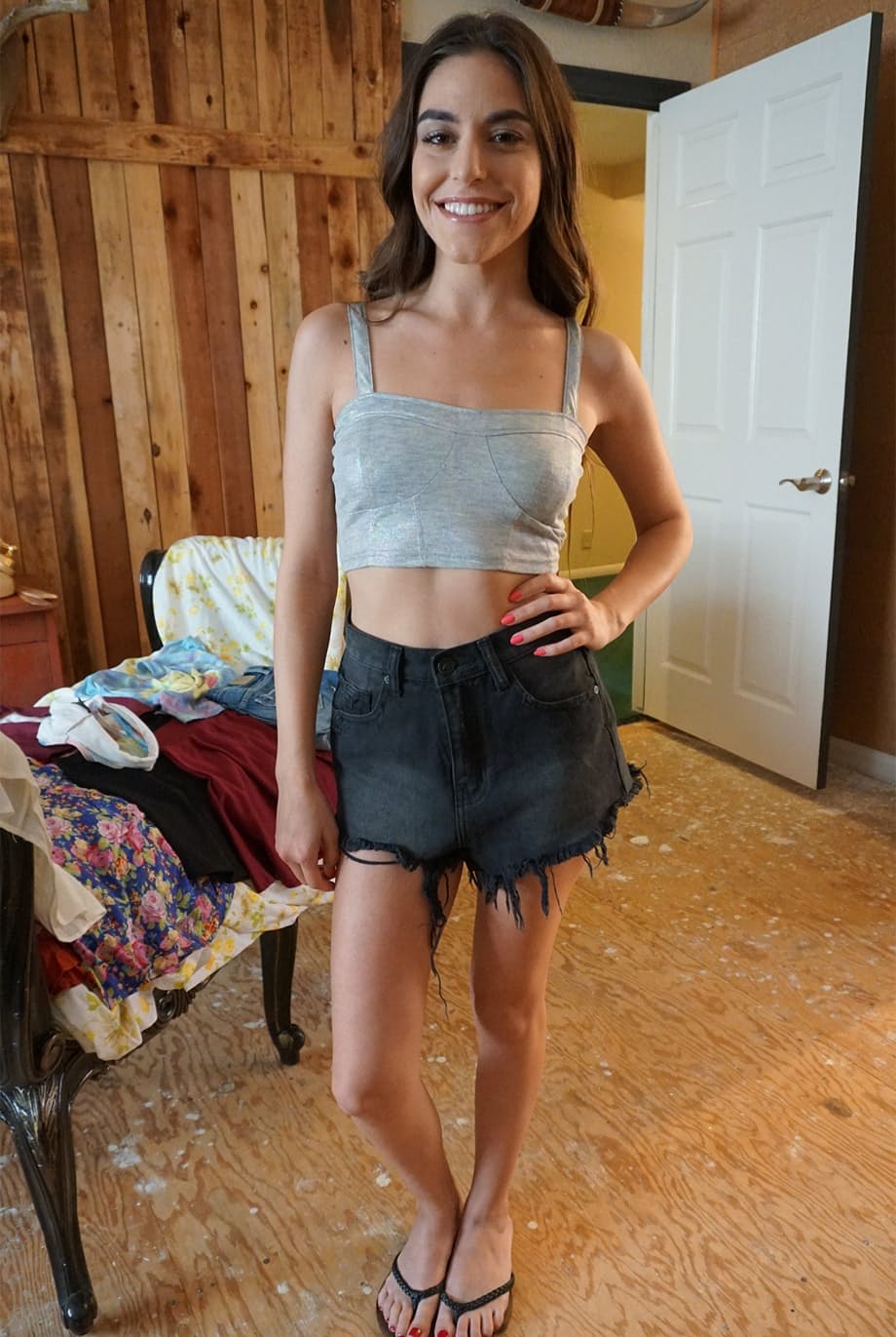Arielle Faye se quita su vestido revelando sus pequeñas y firmes tetas y un diminuto tanga - 17