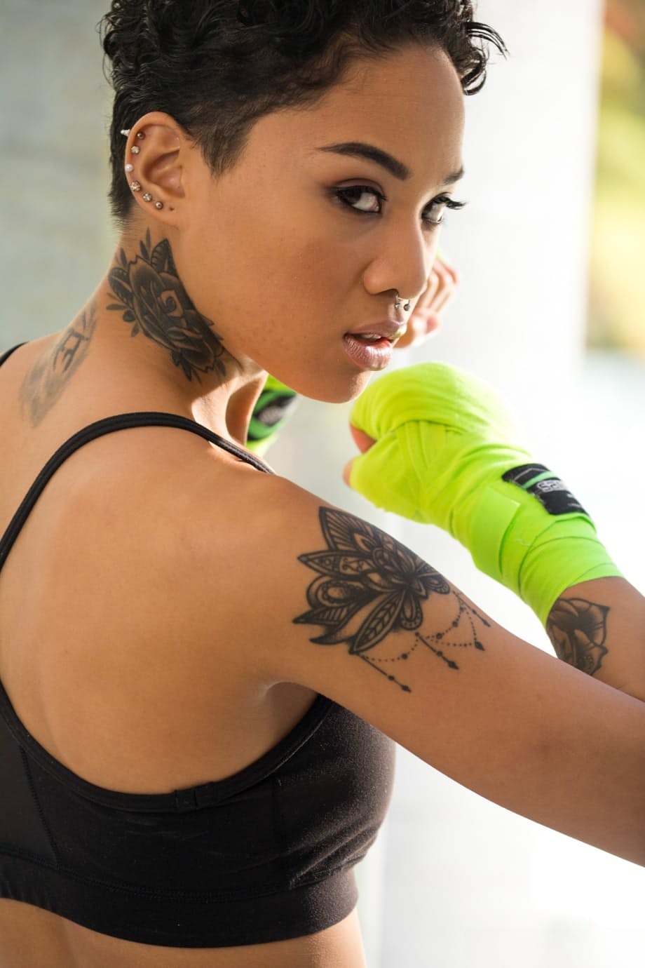 Fitness vixen Honey Gold peels away tiny gym wear to unveil every inch and tattoo - 3