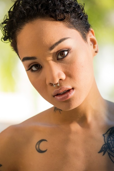 Fitness vixen Honey Gold peels away tiny gym wear to unveil every inch and tattoo - 21