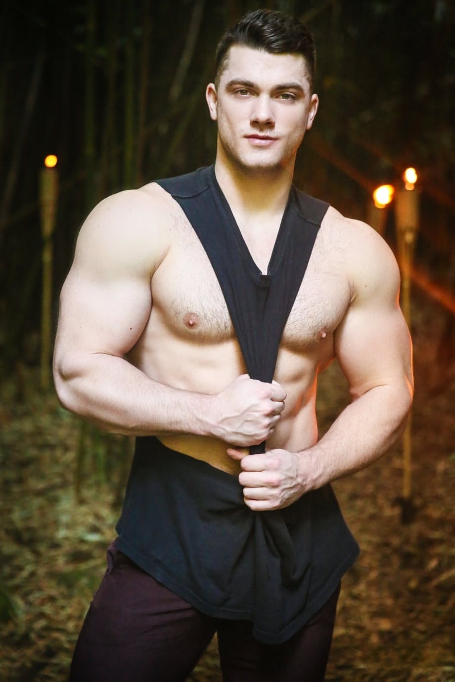 Gay hunks JJ Knight and Collin Simpson have sex while in a jungle