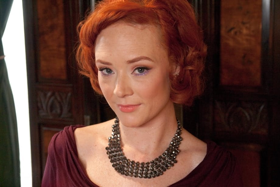 Redhead superstar Audrey Hollander seduces a lucky stud while flaunting her perfect perky assets in thigh-high stockings - 6