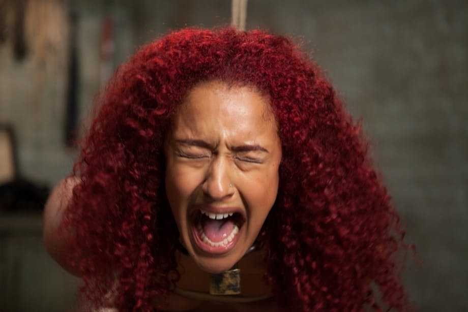 Ebony female Daisy Ducati submits to a hard cock during bondage action