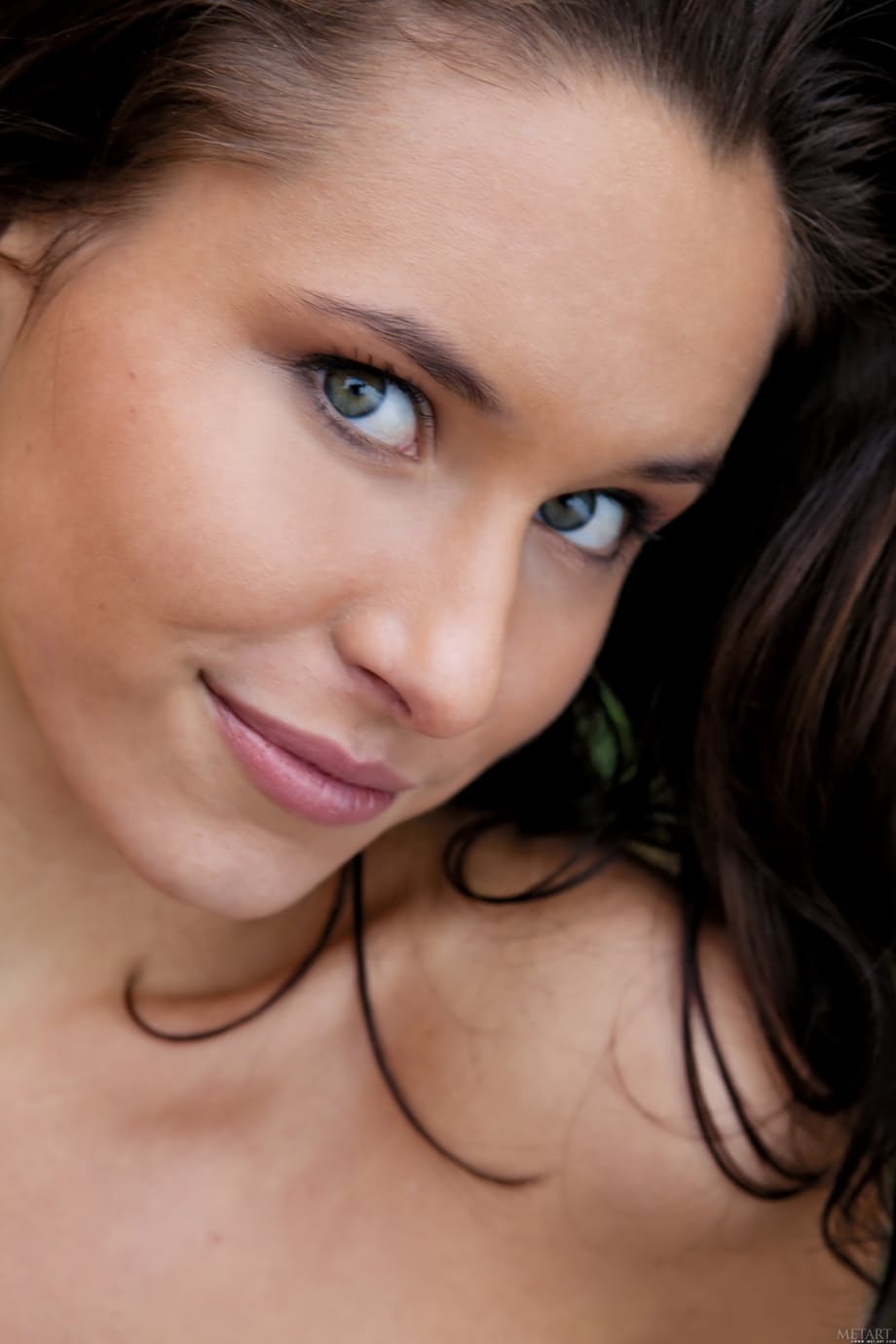 Diana G exposes her petite breasts and bald pussy in seductive outdoor display - 10