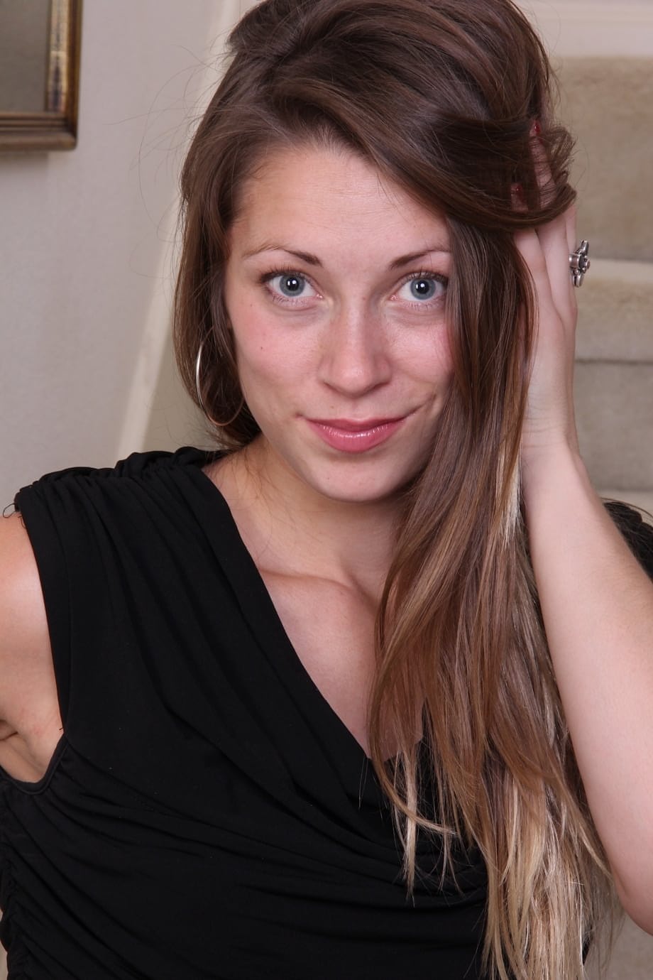 Nice girl Candice Fergison models a black dress before getting totally naked