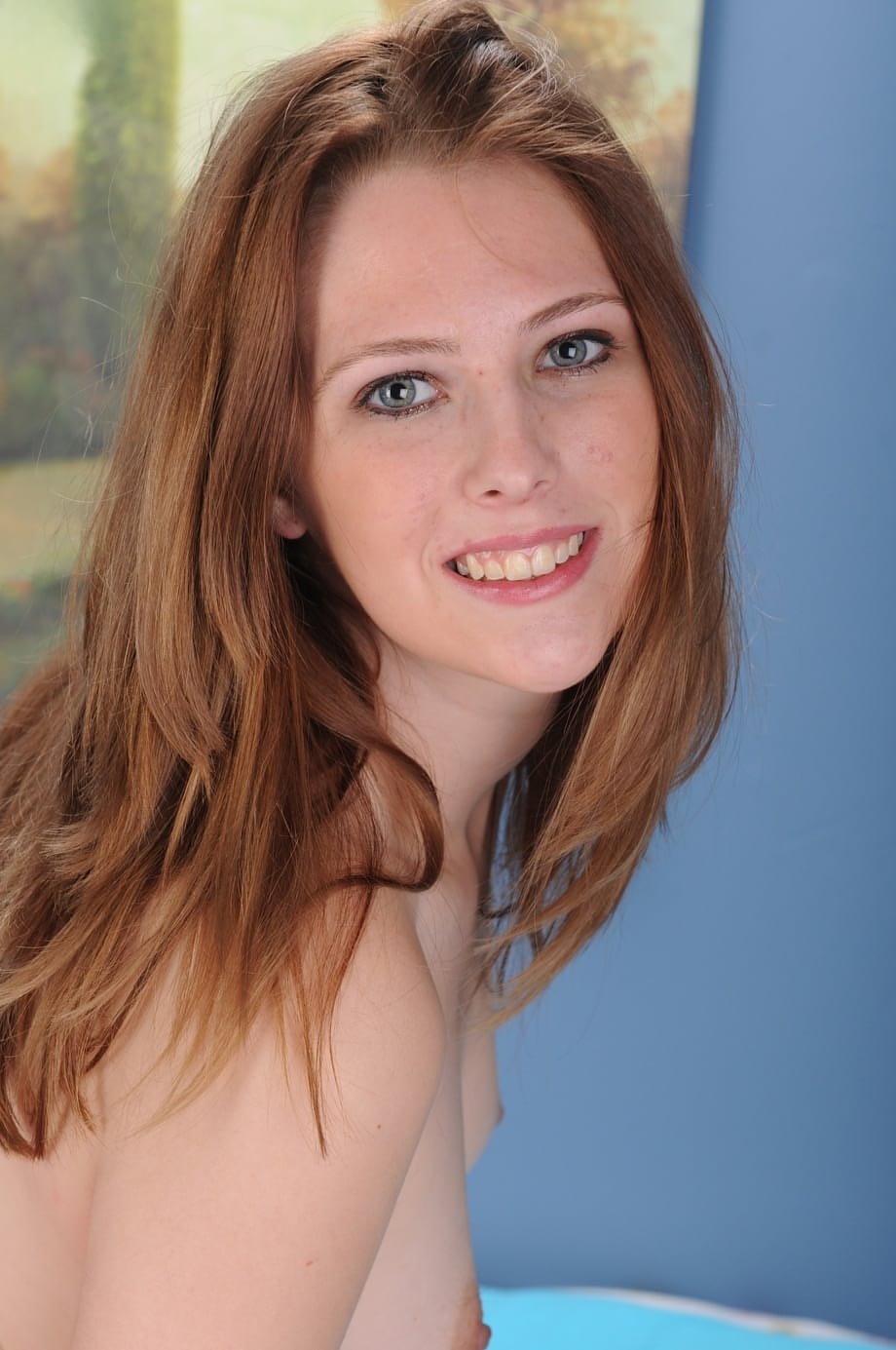 Redheaded teen Angie Tyler spreading and fingering her trimmed twat