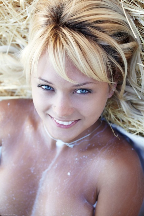 Paglia Nude Teen Blonde Covers Her Slender Body With Fresh Milk On Straw Bale - 19