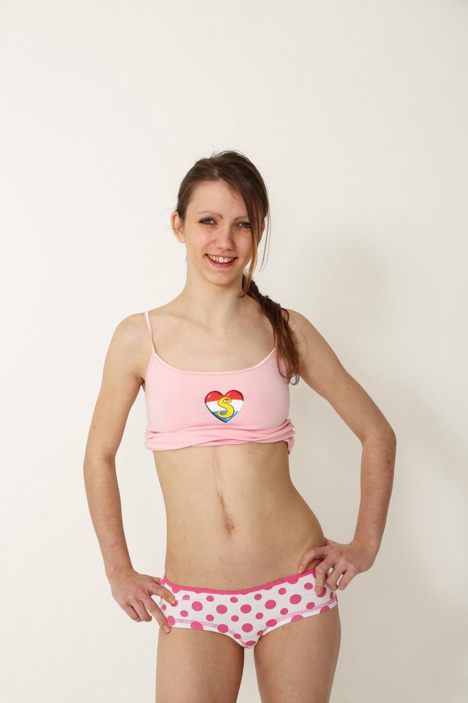 Seductive Brunette Beatrix Glower Strips Naked and Teases with Passionate Slim Body - 19