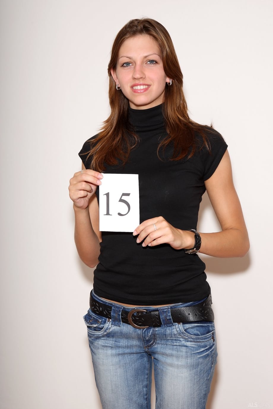 Tall teen Eufrat gets dressed after a nude modelling session is over