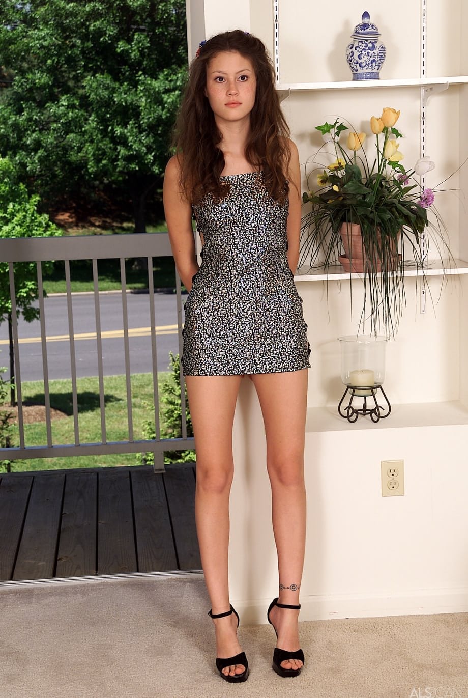 Pantyless teen Trista loses her hot dress and fucks her pussy with a glass toy