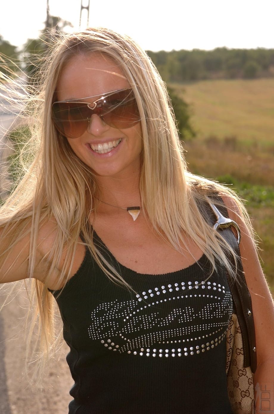 Slender Blonde Dorina shows off her deepthroat skills outdoors for her lucky guy - 1