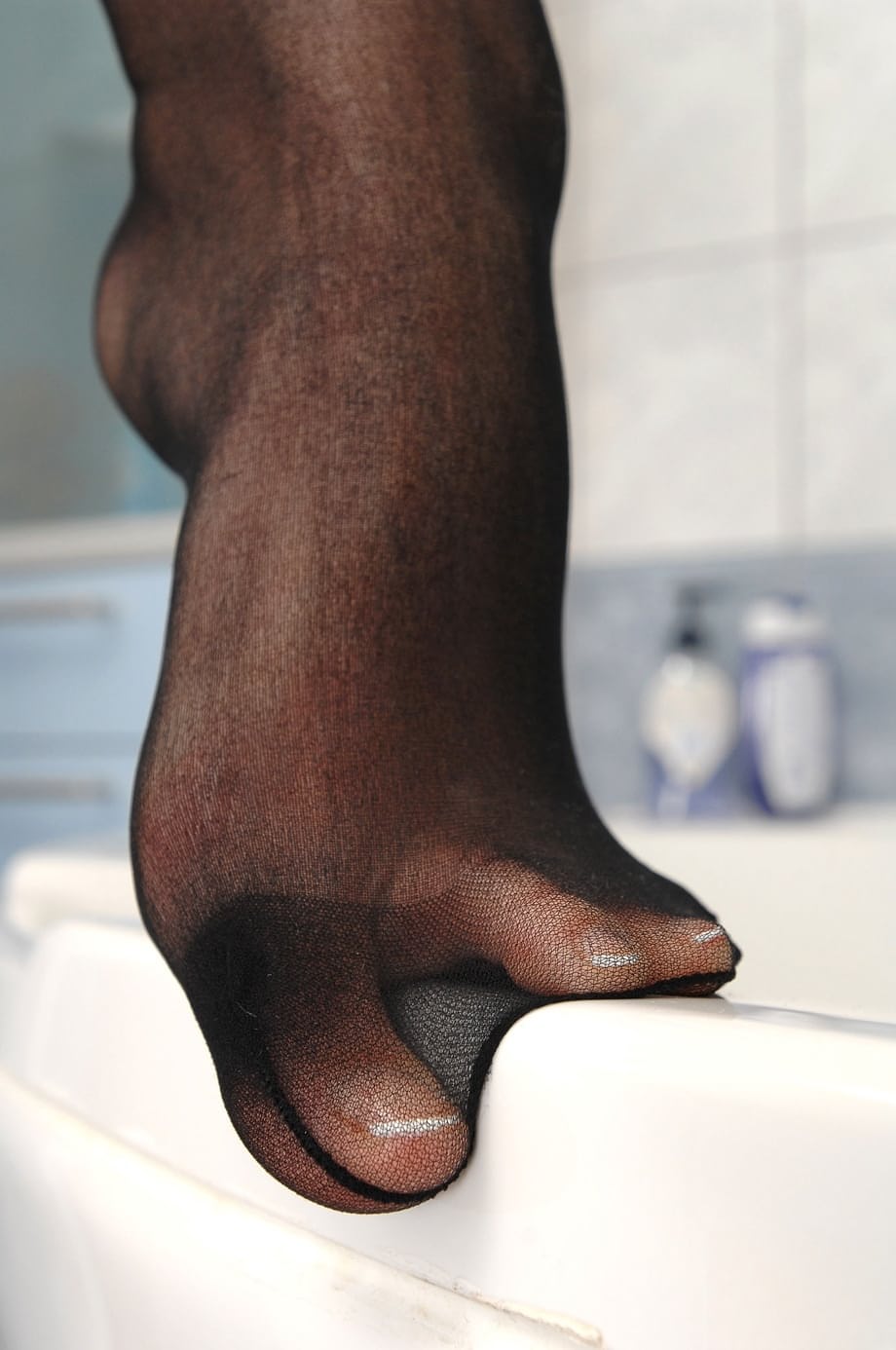 Kathia Nobili's wet, transparent nylons slip away in a seductive bathtub strip show - 4