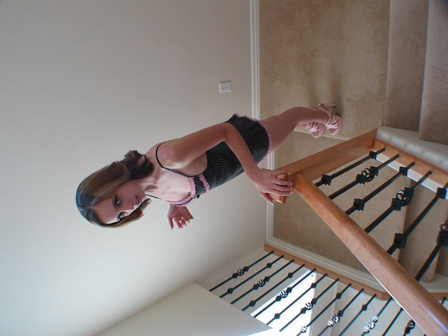 Exquisite MILF temptress Kelly Wells seductively strips her lingerie on the staircase - 14